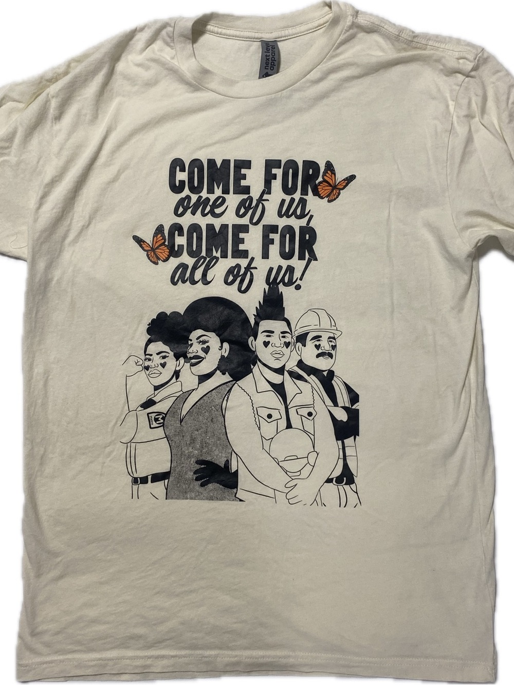 Next Level Apparel Cream Graphic Tee "Come For One of Us, Come For All of Us"